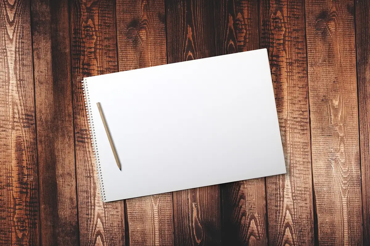 Open script pages and a pen on a table, evoking a romantic drama's premise