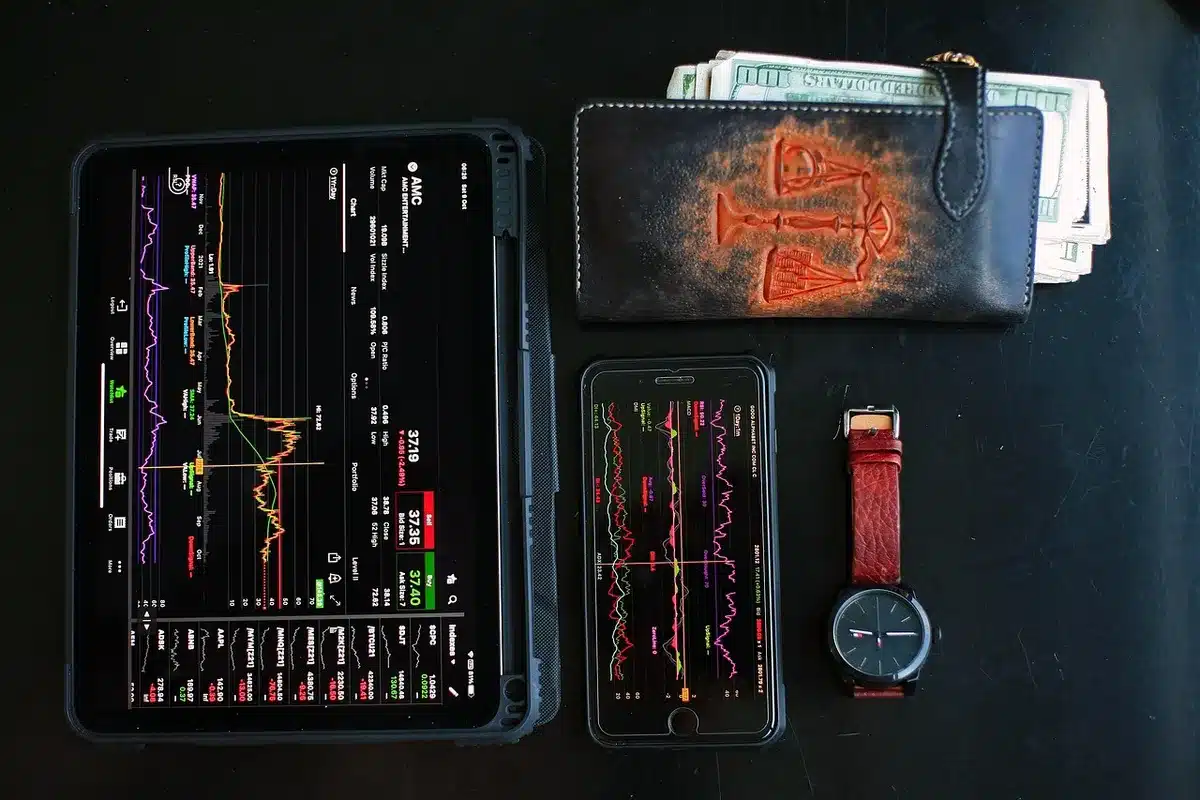 Large screen display of technology stock tickers and charts