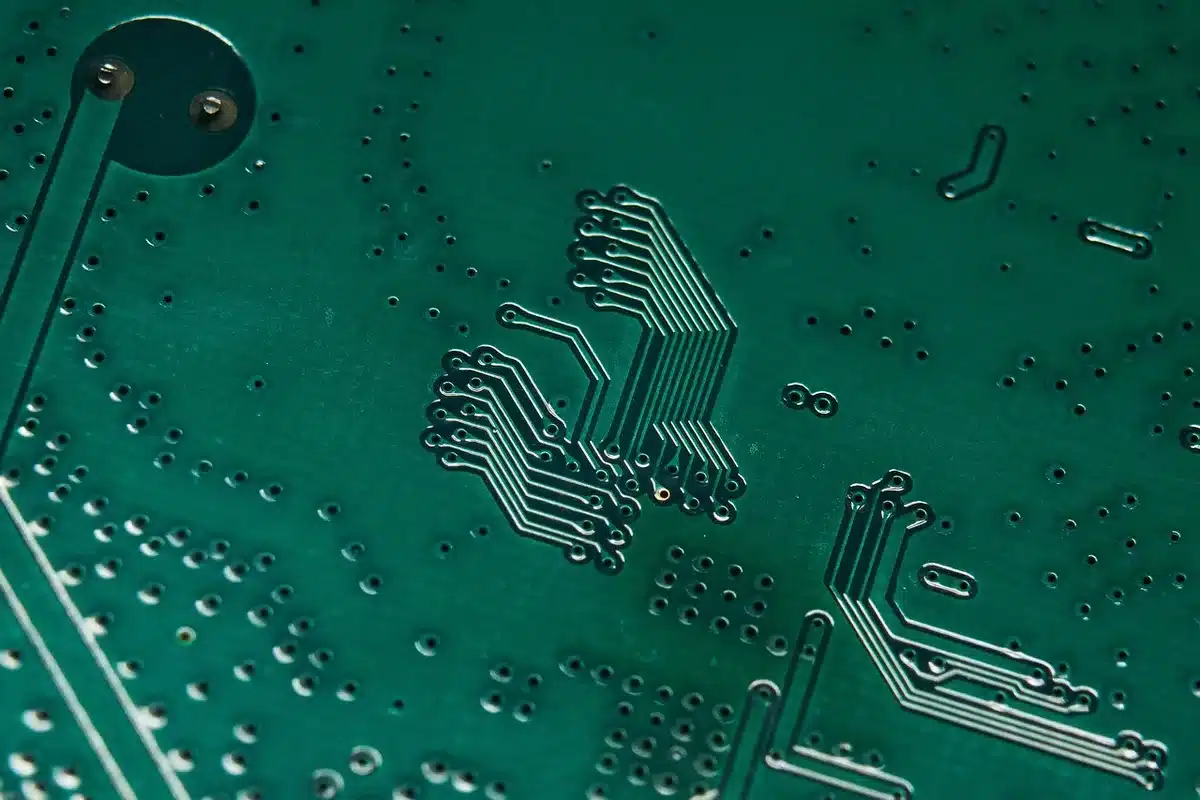 Close-up of computer RAM memory modules installed on a motherboard with visible circuitry and components