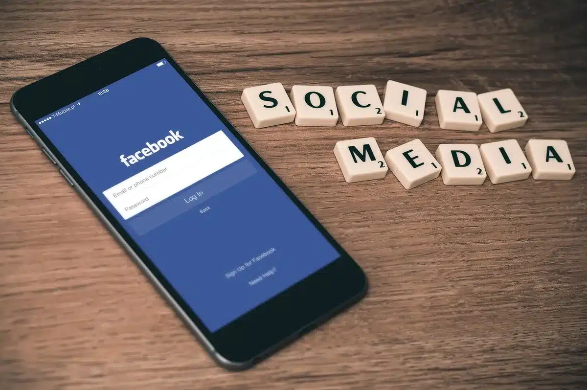 Assorted gossip headlines and social media icons on a screen, illustrative
