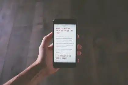 Foldable smartphone with protruding camera module resting unevenly on a flat surface