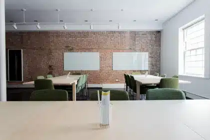 Empty casting room with scripts and a microphone on a table