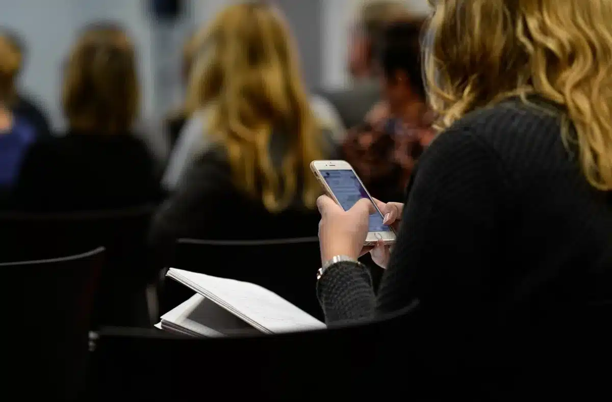 Person about to send an email from a laptop without confirmation