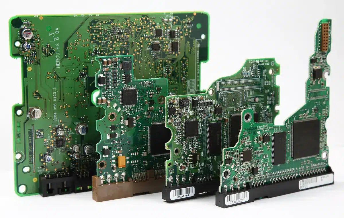 Macro view of circuit board with glowing transistors and electronic components