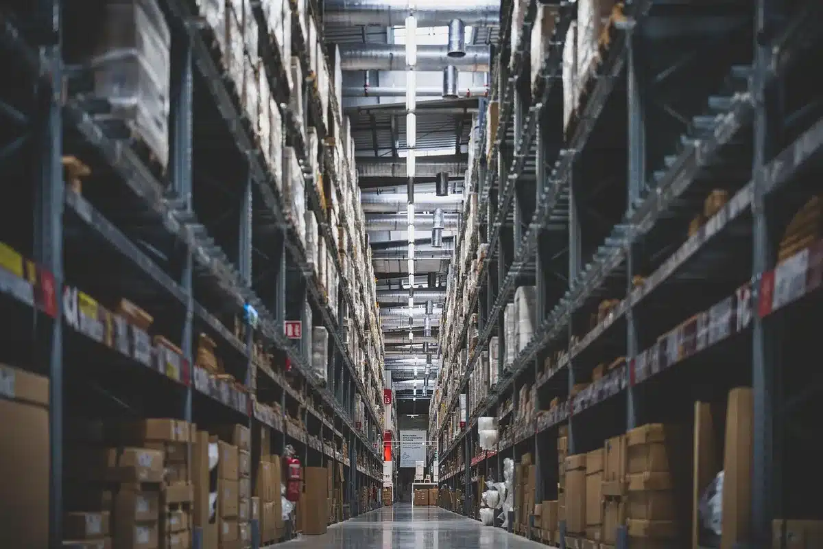 Warehouse with automotive parts and stacked crates representing suppliers
