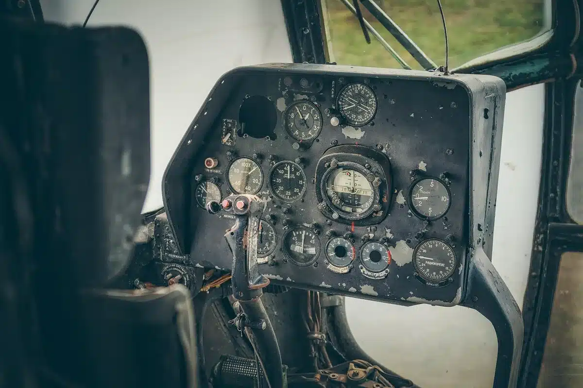 Close-up of cockpit instruments and controls indicating flight status