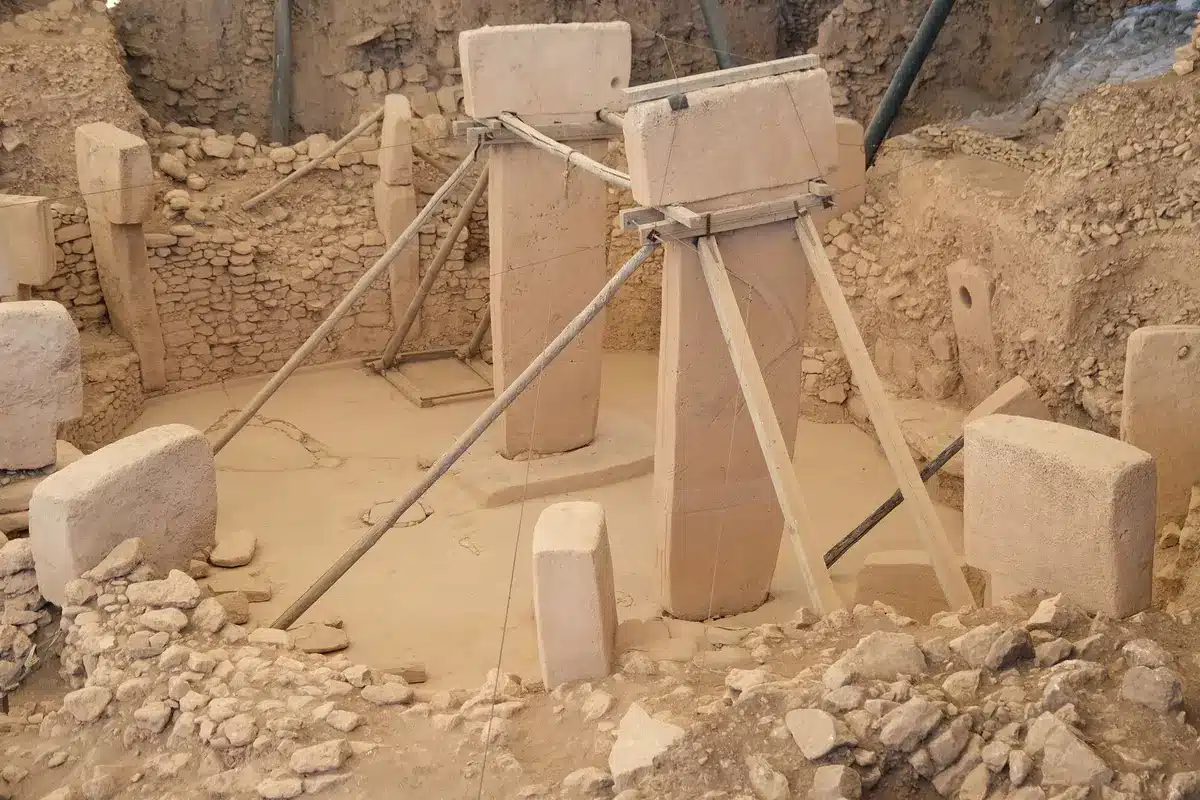 Excavation trench and archaeologists at Hattusha site in Turkey
