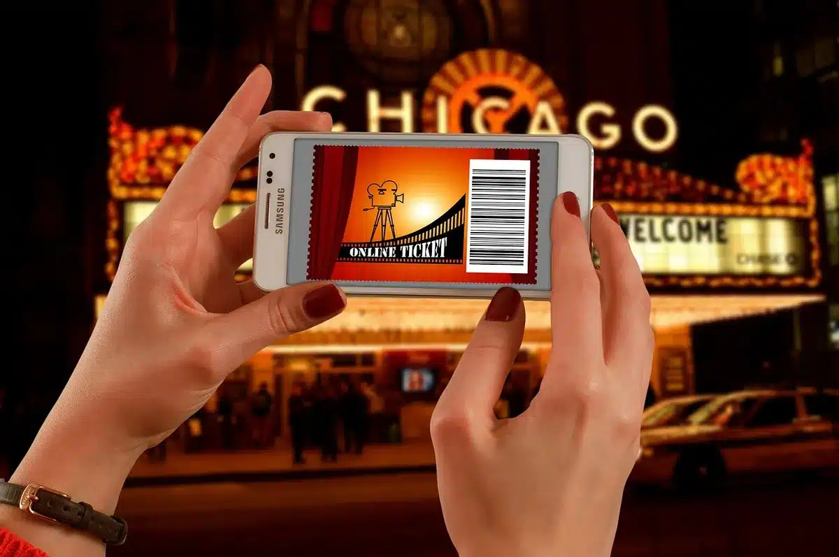 Phone screen showing a movie title page with a ticket purchase button