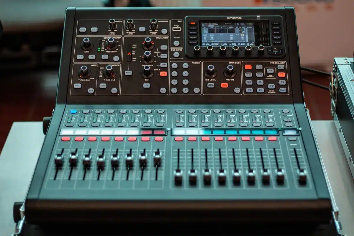 Closeup of small playback and volume controls on a headphone accessory