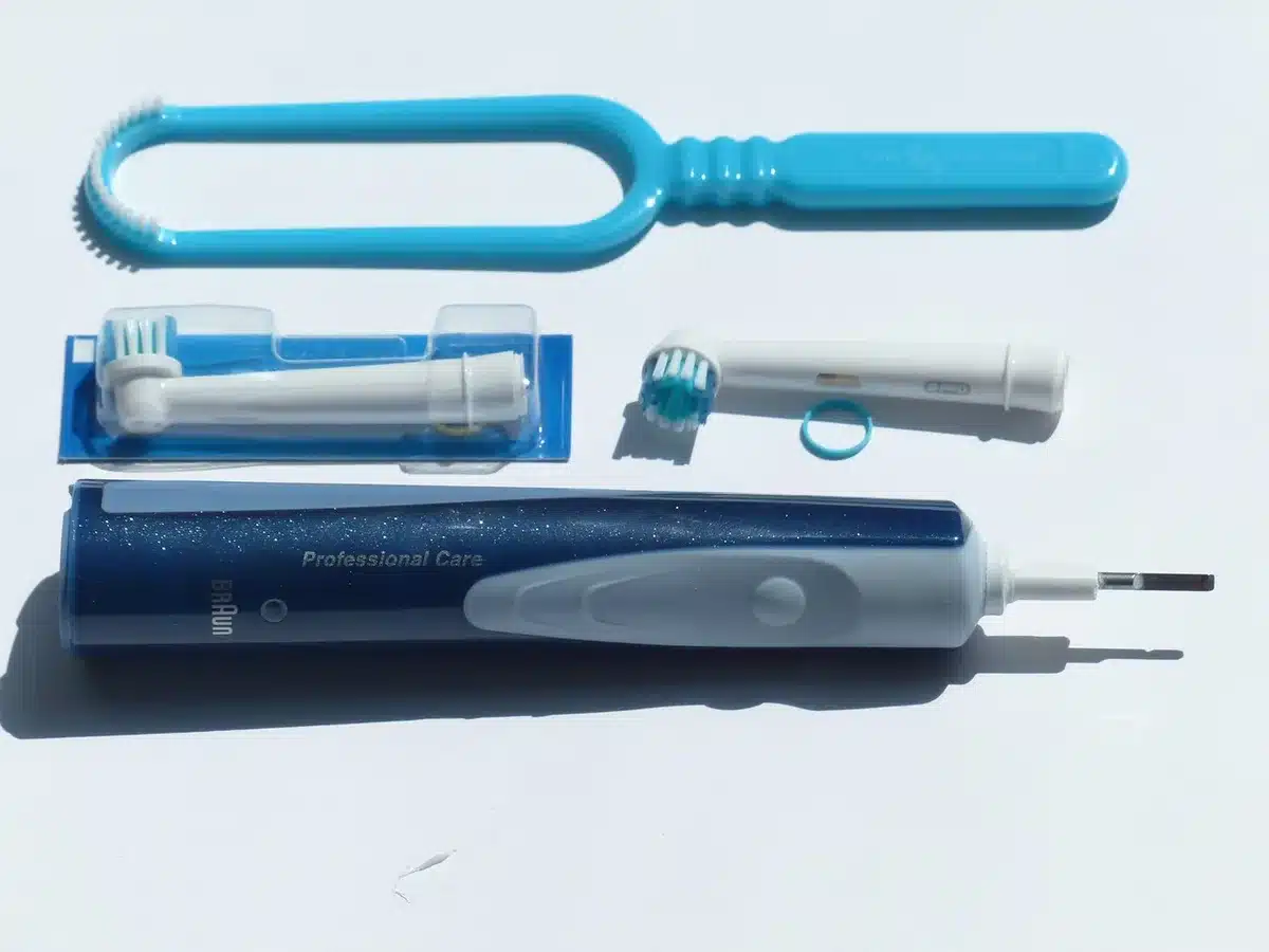 Close-up of a modern electric toothbrush with a camera near the head