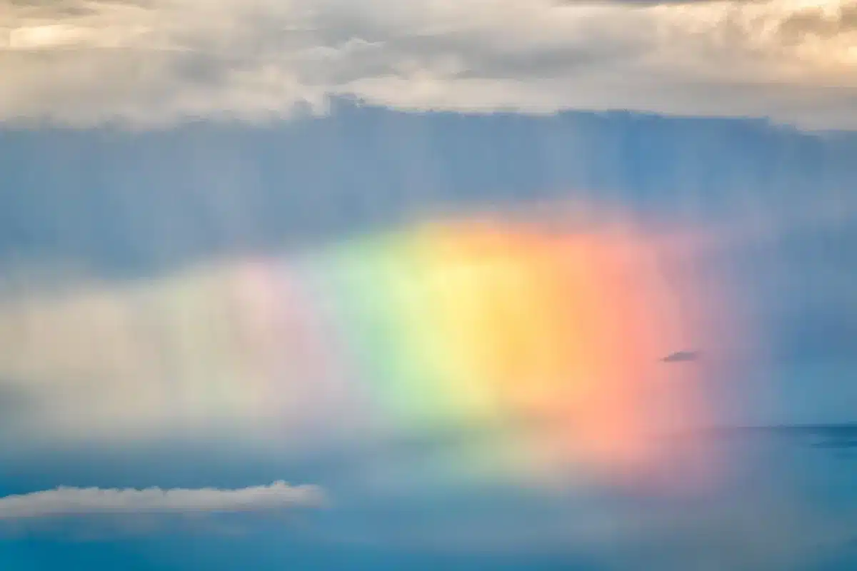 Graphical spectrum mapped to visible color showing absorption features