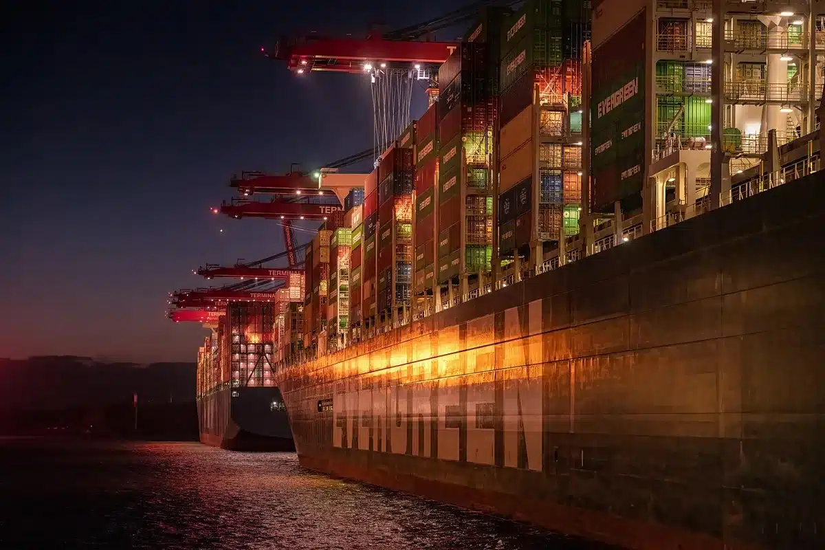 Cargo freighter at an airport apron near a logistics hub