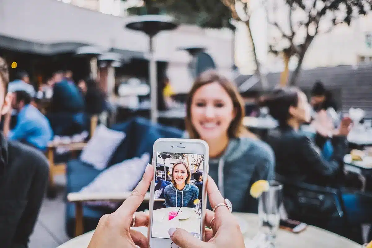 Person scrolling social media comments on a smartphone