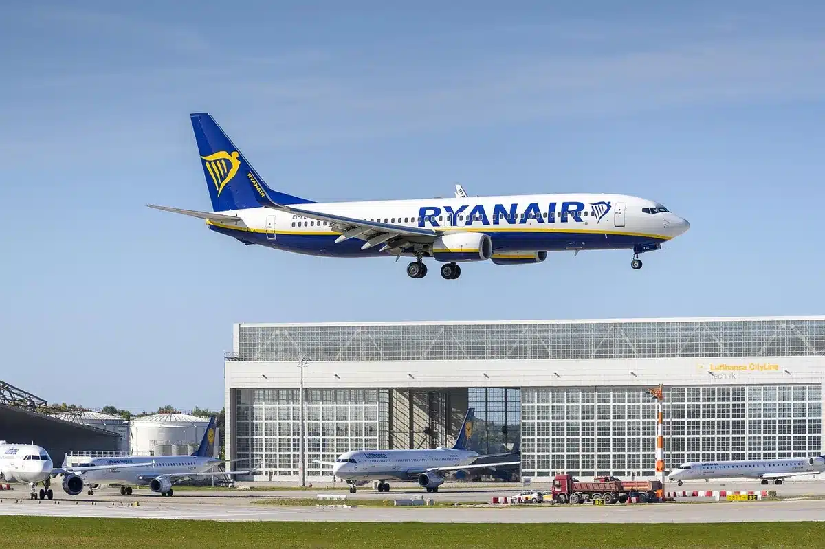 Small regional runway and parked turboprop at a remote airport