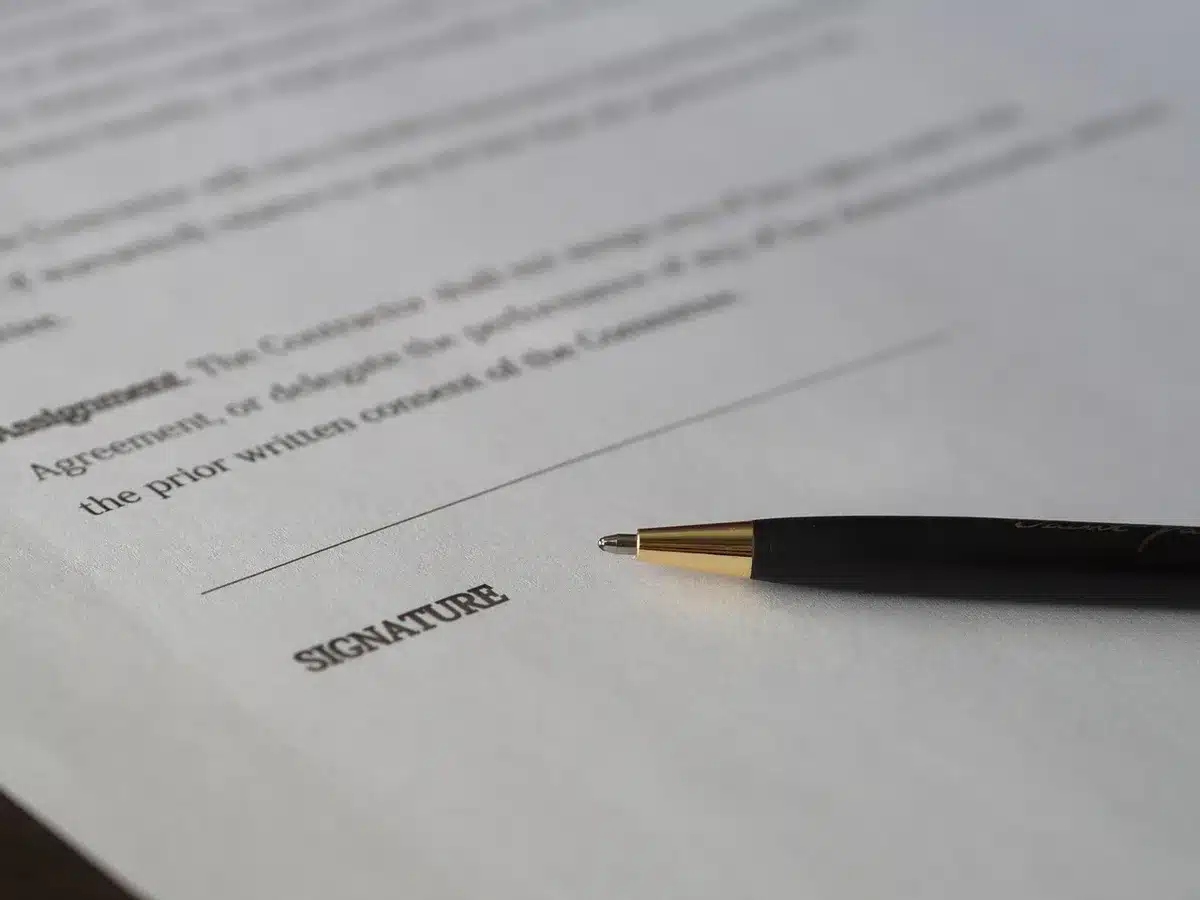 Stack of legal documents and folders about asset division
